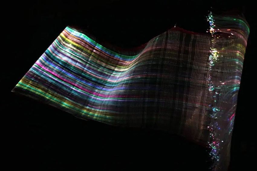 Sandra De Berduccy, e-Awayo, Interactive textile, Fiber optic weave, electrical components, LEDs and proximity sensor | Working Artist Org. Sandra De Berduccy, e-Awayo, Interactive textile, Fiber optic weave, electrical components, LEDs and proximity sensor